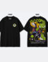 Black oversized Dragon Ball Z t-shirt featuring Piccolo's iconic chest emblem on the front and a large manga-inspired Piccolo artwork on the back with neon green and purple accents.