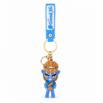 Avatar-inspired blue warrior PVC keychain featuring a detailed blue tribal character, gold-tone keyring, lobster clasp, and blue silicone wrist strap with "Good Luck" text on a white background.